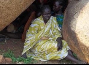 Women hide from bombers