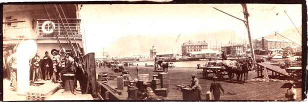 Cape Town docks with carts, ships