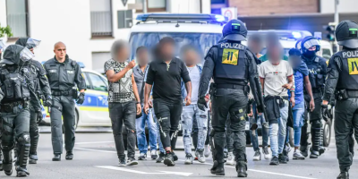 Police escort Eritrean protesters in Stuttgart