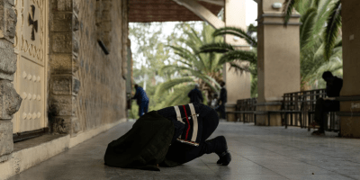 Shila prays at an Orthodox Christian church in Mekelle. She does not know whether her fragile family will remain intact. She fears that her husband will leave her because she was raped and had a child not his.
