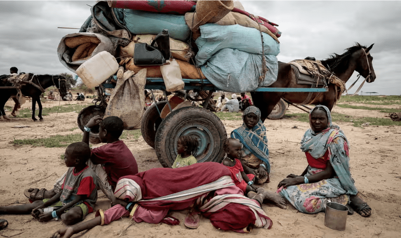 A Sudanese family who fled the conflict in Darfur region wait to be registered in Adré after crossing the border between Sudan and Chad. Photograph: Zohra Bensemra/Reuters
