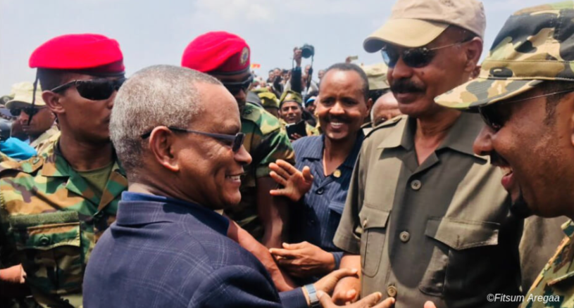 PM Abiy Ahmed and President Isaias Afwerki exchanging pleasantries with Debretsion Gebremichael, then deputy president of Tigray regional state during the reopening of Bure and Zalambesa border crossings in September 2018