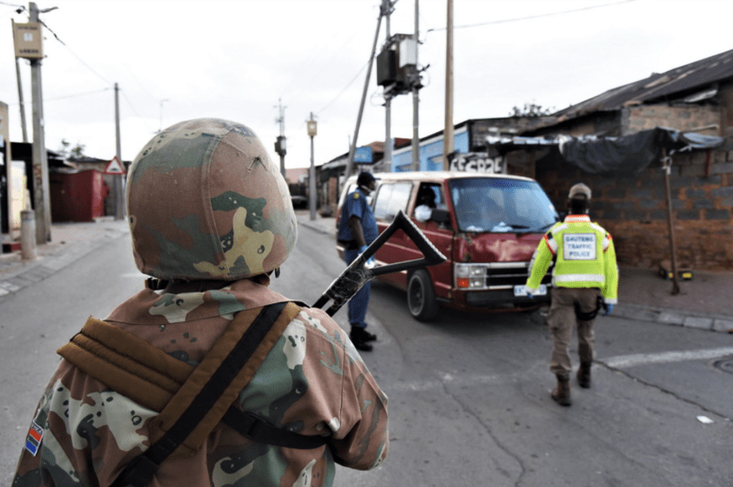 oldier backing up a Gauteng traffic officer during the July 2021 unrest