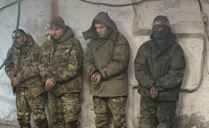 Captured Russian invaders with an African mercenary