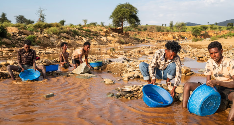 These artisanal miners near the Eritrean border pan for gold manually, without the heavy machinery that the newer, larger operations use. The young men were displaced by the war.Claire Wilmot/The Globe and Mail