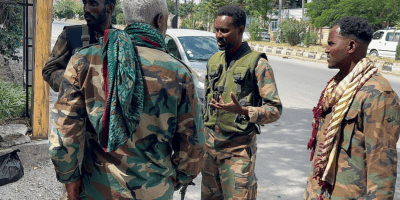 Members of the Ethiopian pro-government Tigray Peace Force (TPF) patrol after the Tigray People's Liberation Front (TPLF) army retreated from the regional capital Mekelle